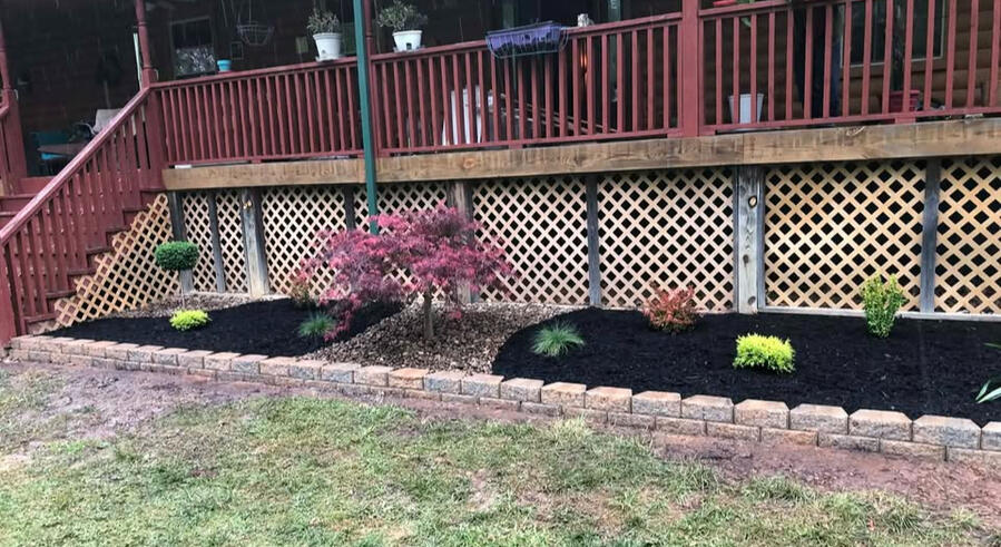 Landscape Renovation Fairdale, WV Property transformation with newly installed garden bed, hardscaped retaining wall, in Fairdale, WV 25839